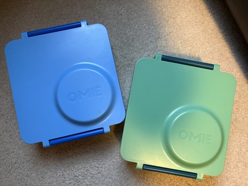 Two omie lunch - box’s, blue